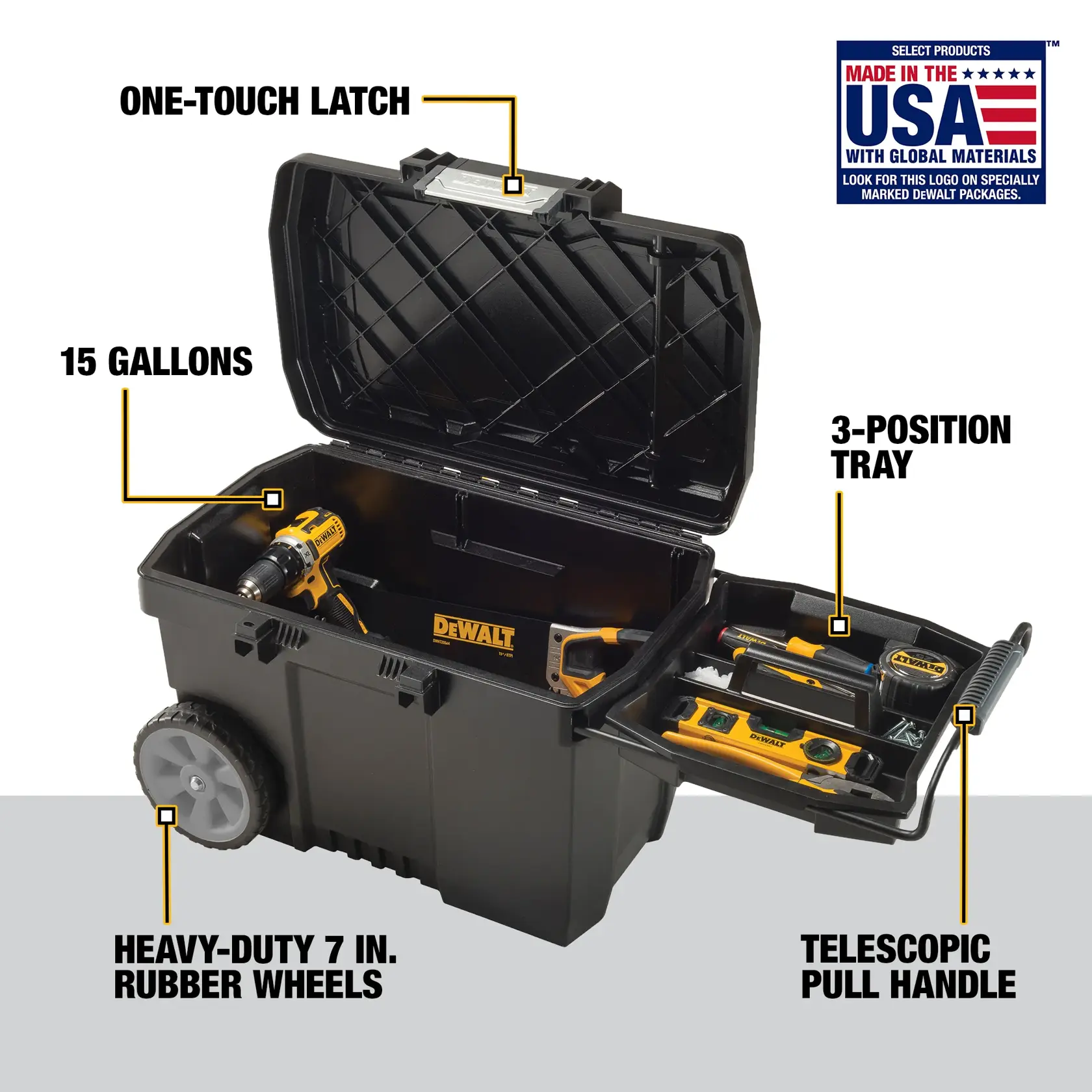 A DEWALT rolling tool box, model DWST33090, is shown open and filled with power tools and hand tools. The tool box has a one-touch latch, a 3-position tray, a telescopic pull handle, and heavy-duty 7-inch rubber wheels. It has a 15 gallon capacity. There is a label in the top right corner indicating it is made in the USA with global materials.