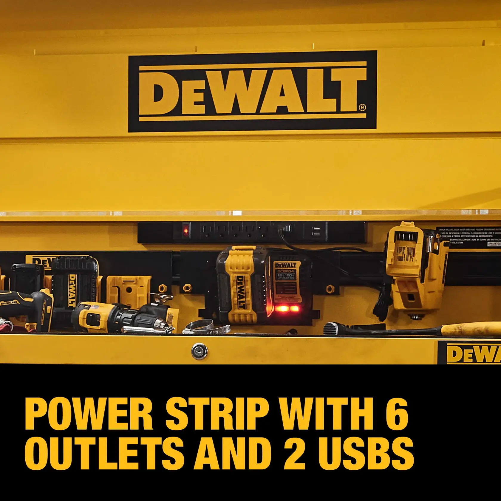 A DEWALT-branded yellow workbench featuring a power strip with 6 outlets and 2 USB ports, surrounded by various DEWALT tools and chargers.