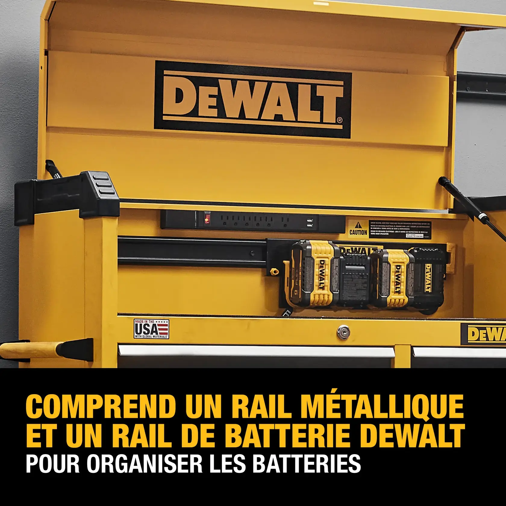 A yellow DEWALT tool storage cabinet with an open top lid, featuring a metal rail and battery rail used to organize DEWALT batteries. Text on the image highlights that the product includes a metal rail and battery rail to organize batteries.