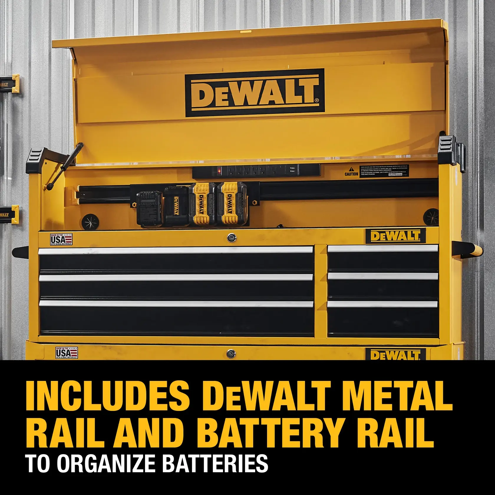 A yellow DEWALT tool chest with open lid, showing metal rail and battery rail for organizing batteries. The chest features several drawers and DEWALT branding, with text advertising the battery organization feature.