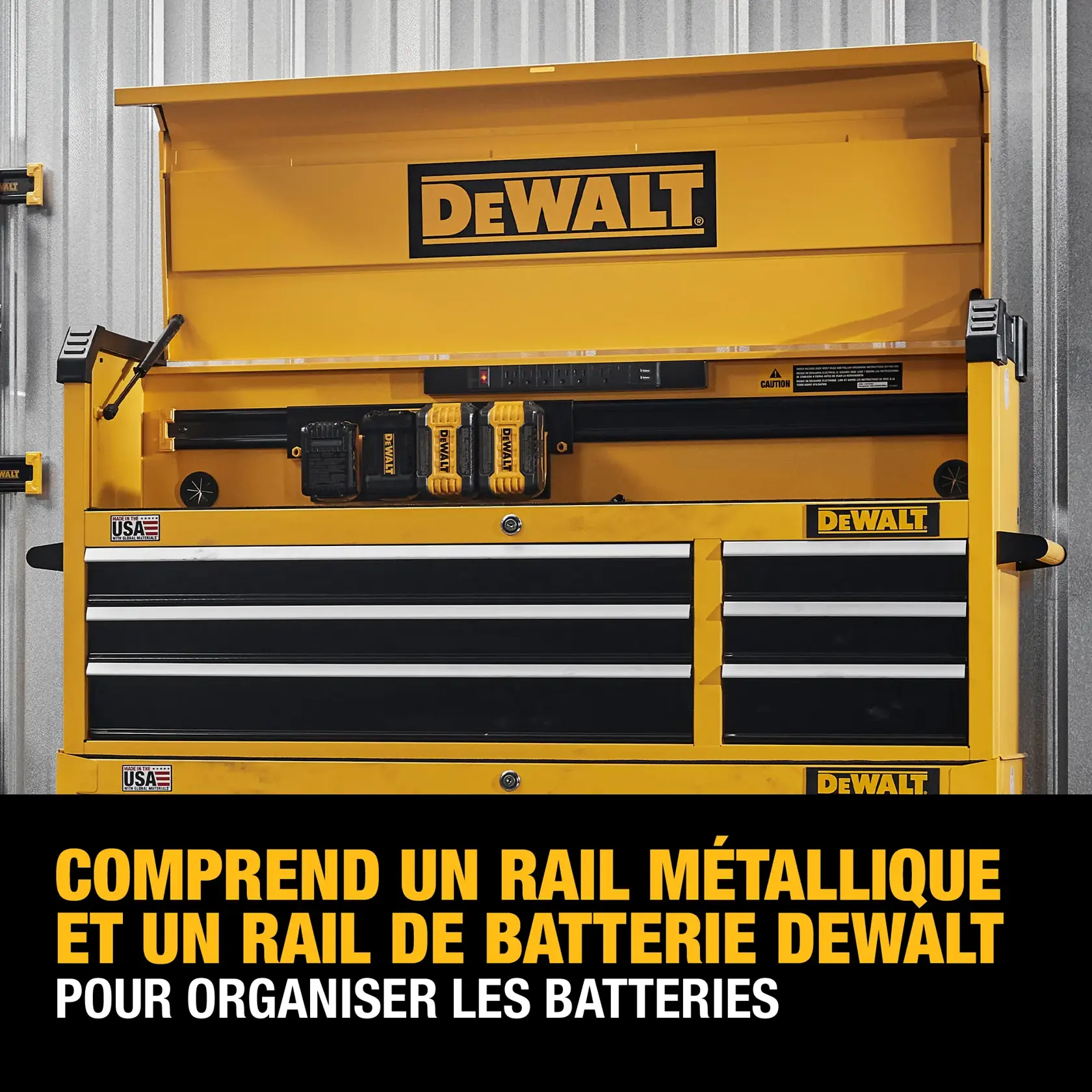 A yellow DEWALT tool chest with open lid, showing metal rail and battery rail for organizing batteries. The chest features several drawers and DEWALT branding, with text advertising the battery organization feature.