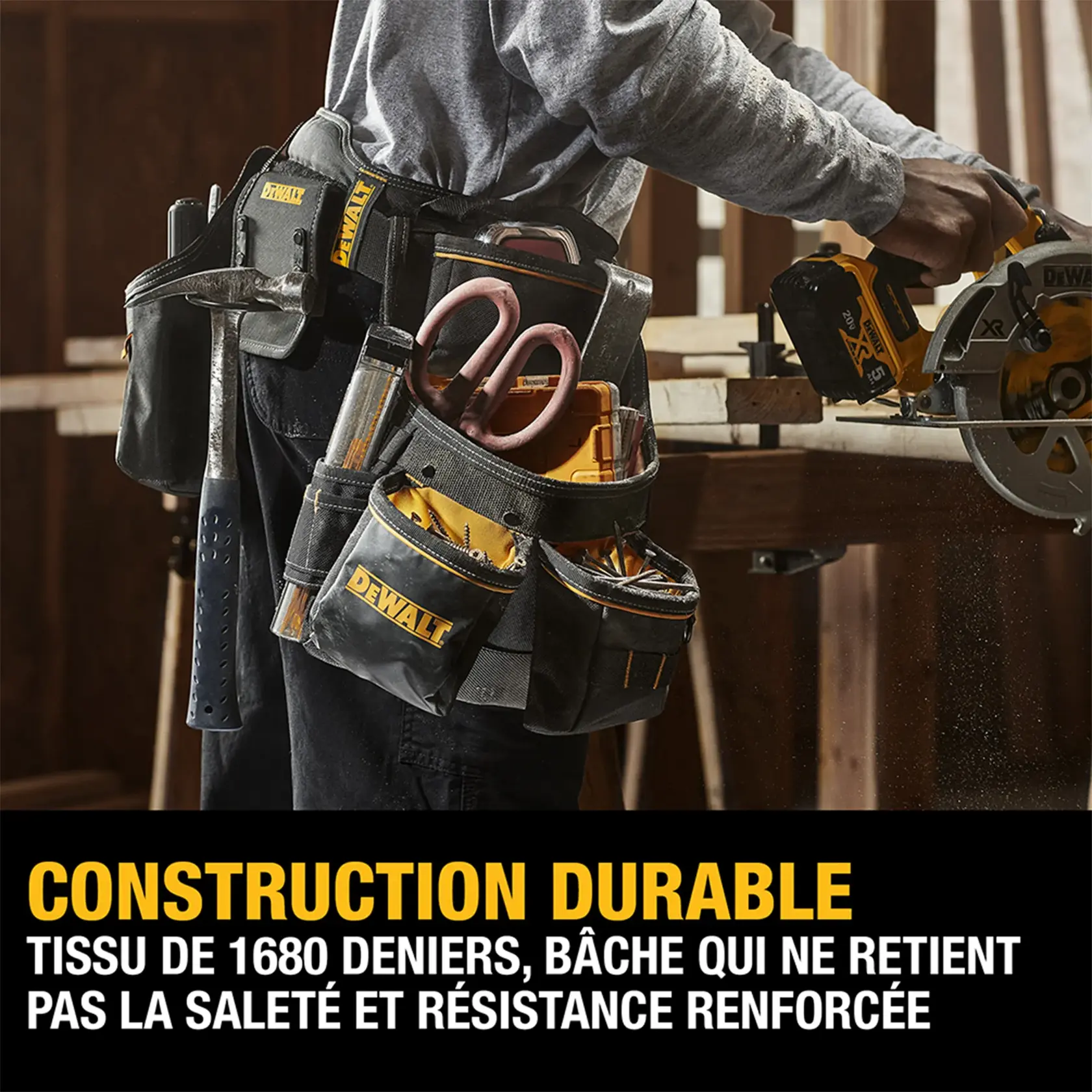 A person wearing a DEWALT tool belt filled with various tools, working with a DEWALT power saw in a woodworking environment. The image highlights the tool belt's durable construction featuring 1680 denier fabric, dirt-repellant tarpaulin, and reinforced strength.