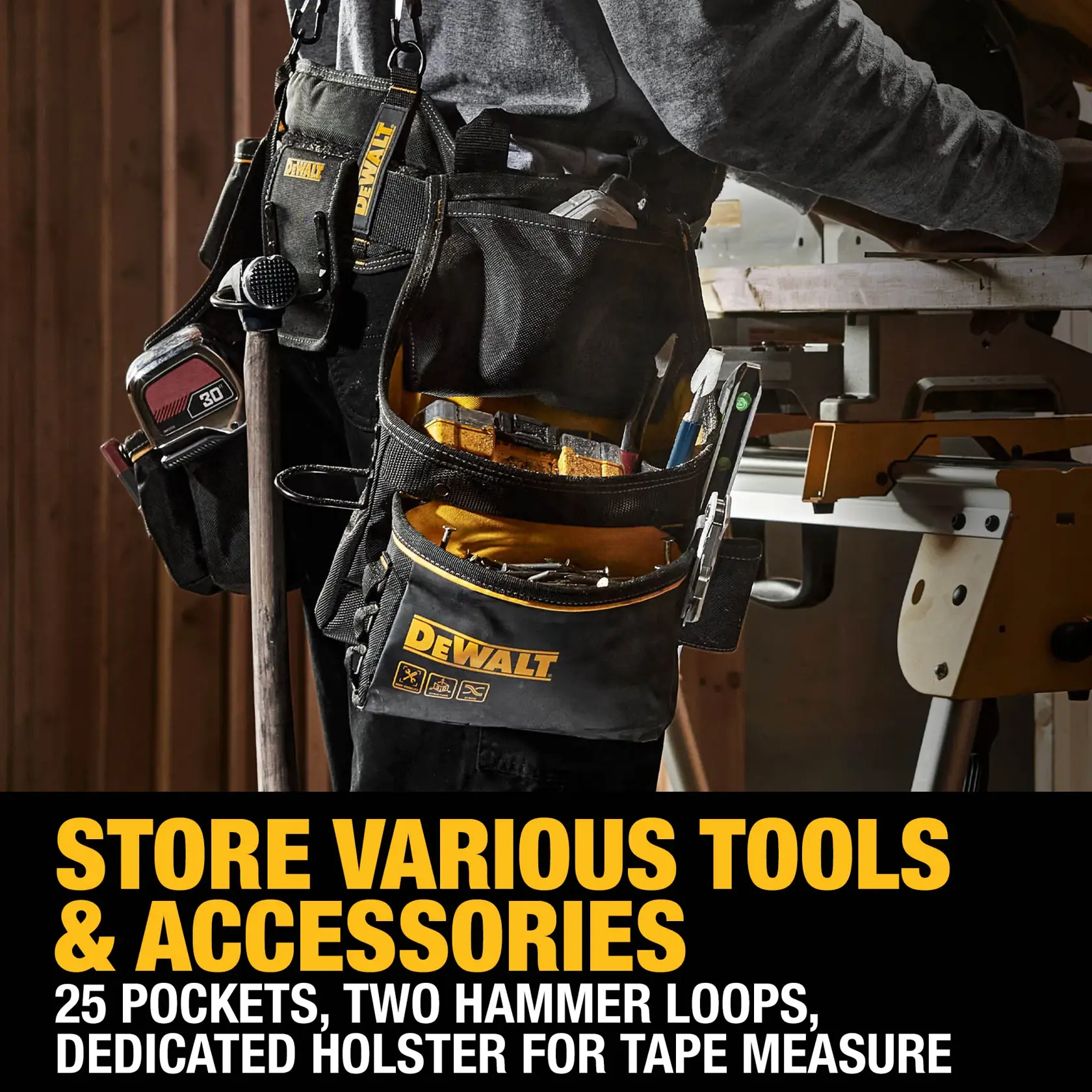 A DEWALT branded tool belt with multiple pockets and compartments, worn by a person working in a workshop. The belt is loaded with various tools and accessories, and includes features such as 25 pockets, two hammer loops, and a dedicated holster for a tape measure. Bold text on the image highlights the product's storage capabilities.