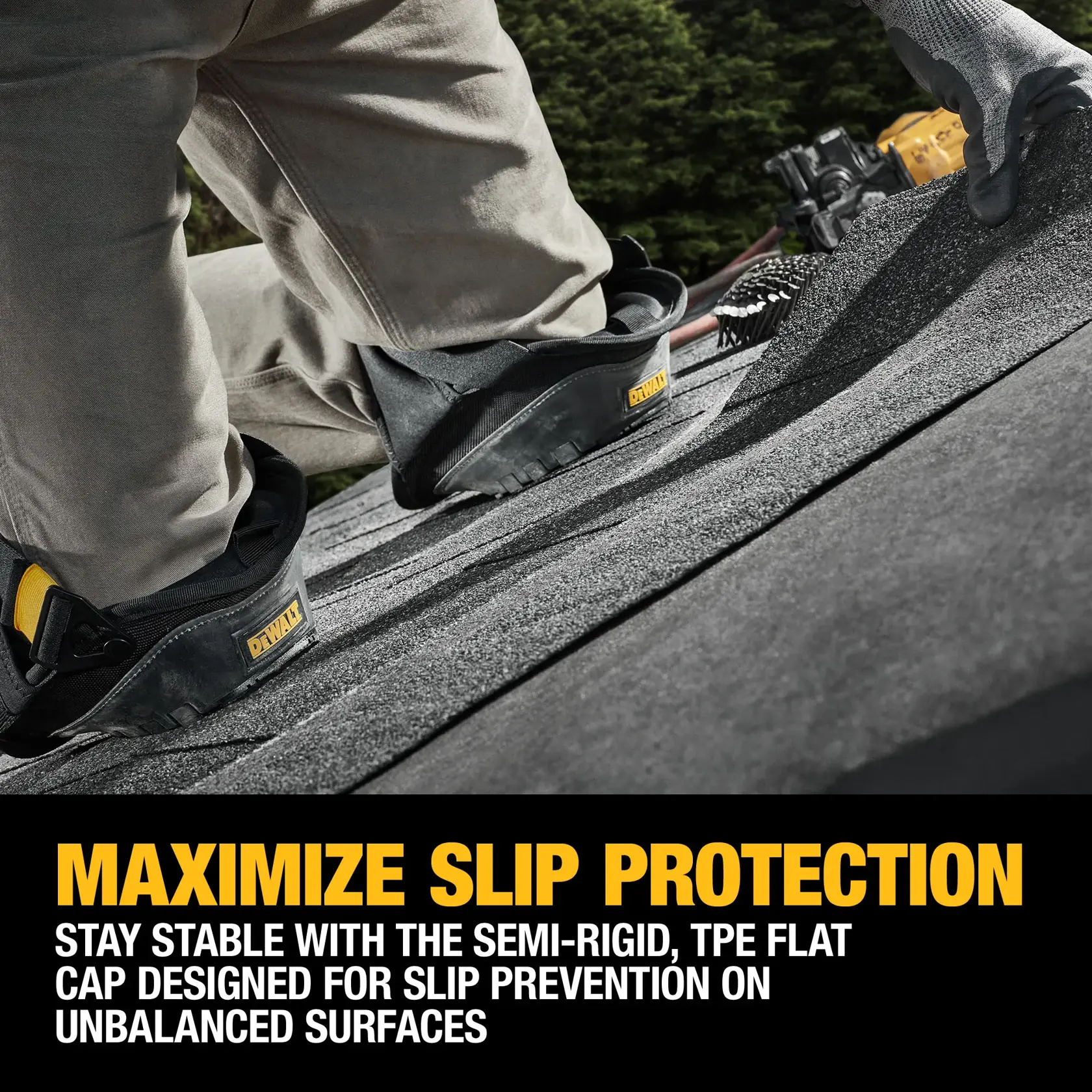 A close-up view of a person kneeling on a rooftop, wearing DEWALT slip-protection work gear on their knees. The image highlights the semi-rigid TPE flat cap feature designed to prevent slipping on unbalanced surfaces.