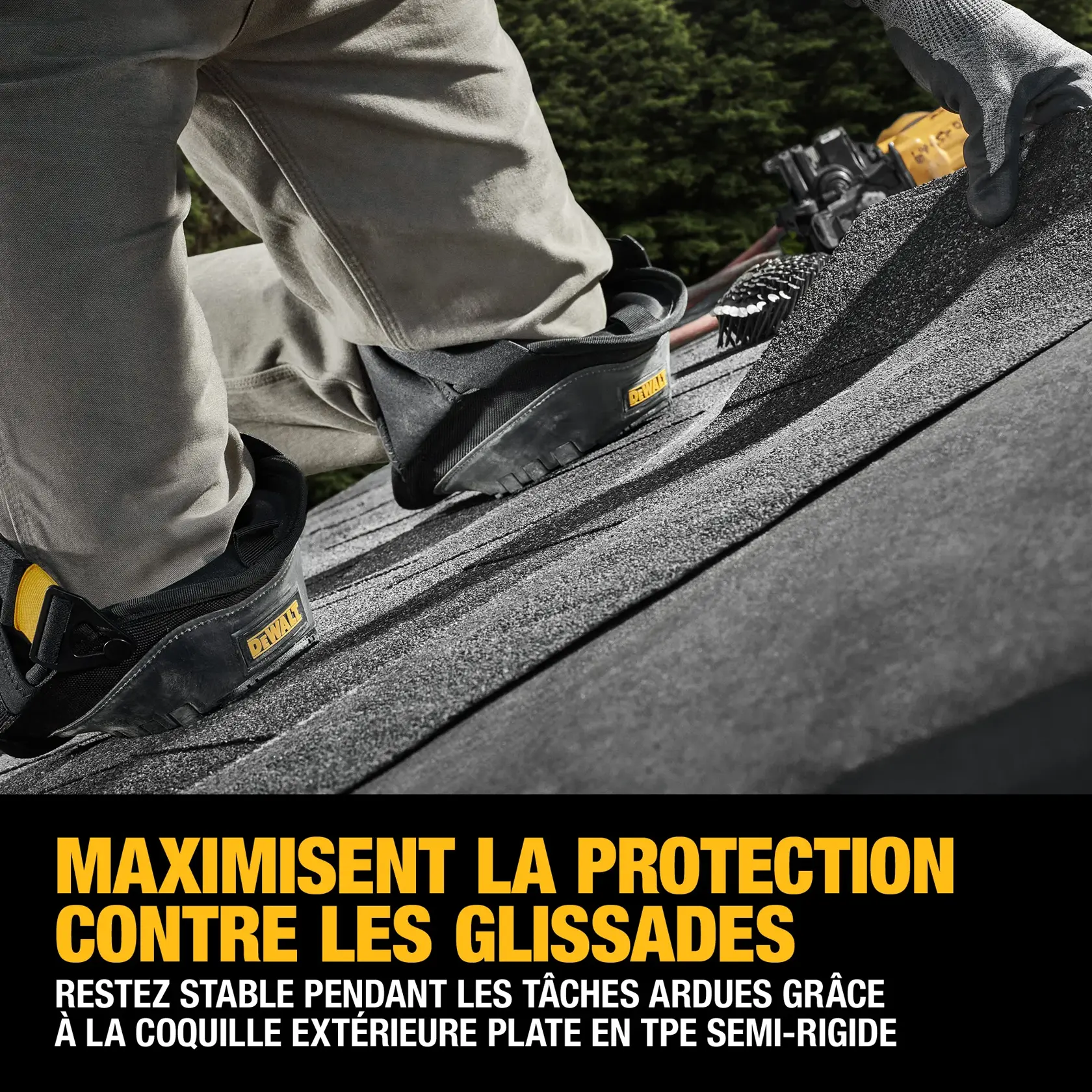 A close-up view of a person kneeling on a rooftop, wearing DEWALT slip-protection work gear on their knees. The image highlights the semi-rigid TPE flat cap feature designed to prevent slipping on unbalanced surfaces.