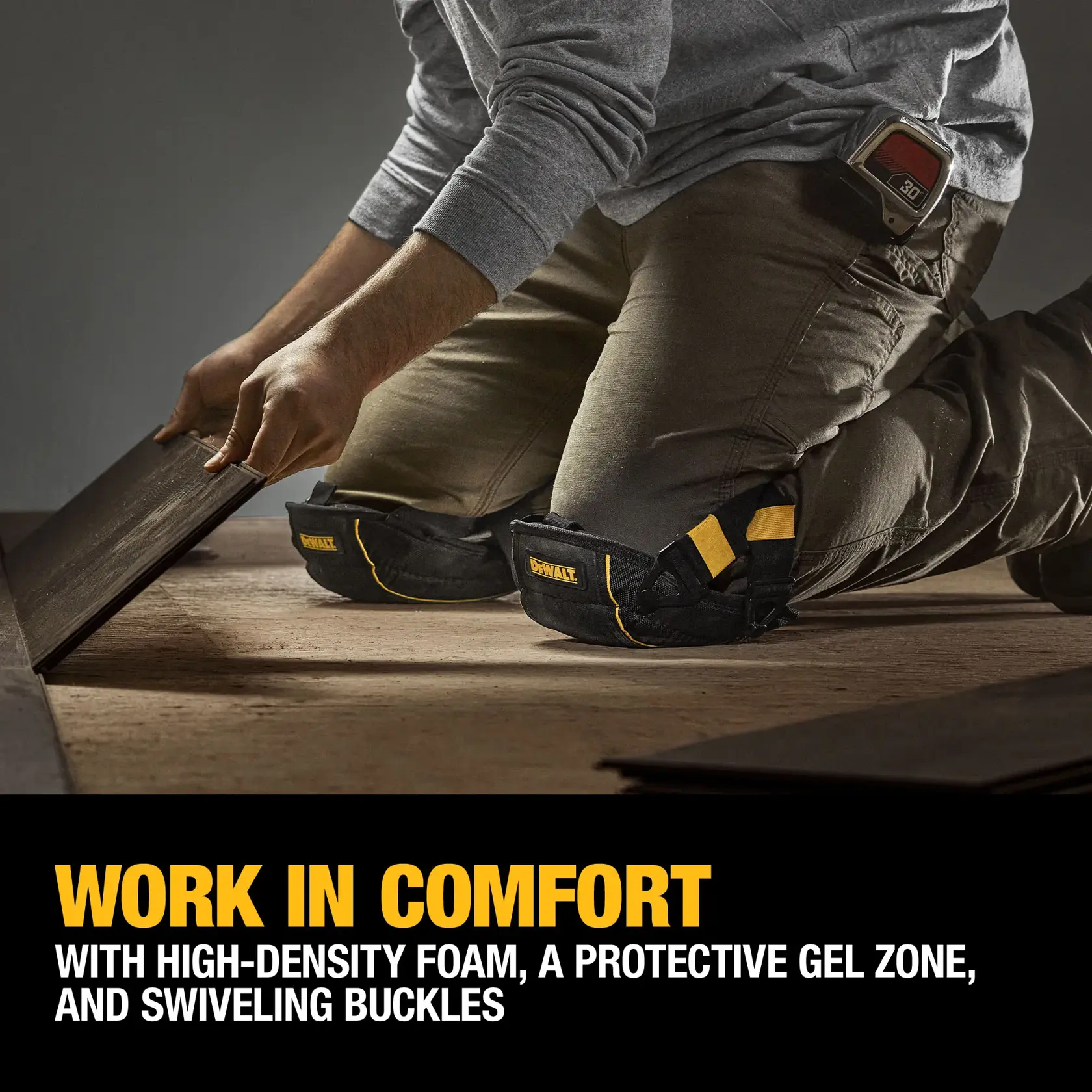 A person is kneeling on the floor while installing wooden planks, wearing DEWALT branded knee pads. Text on the image highlights comfort features: high-density foam, a protective gel zone, and swiveling buckles.
