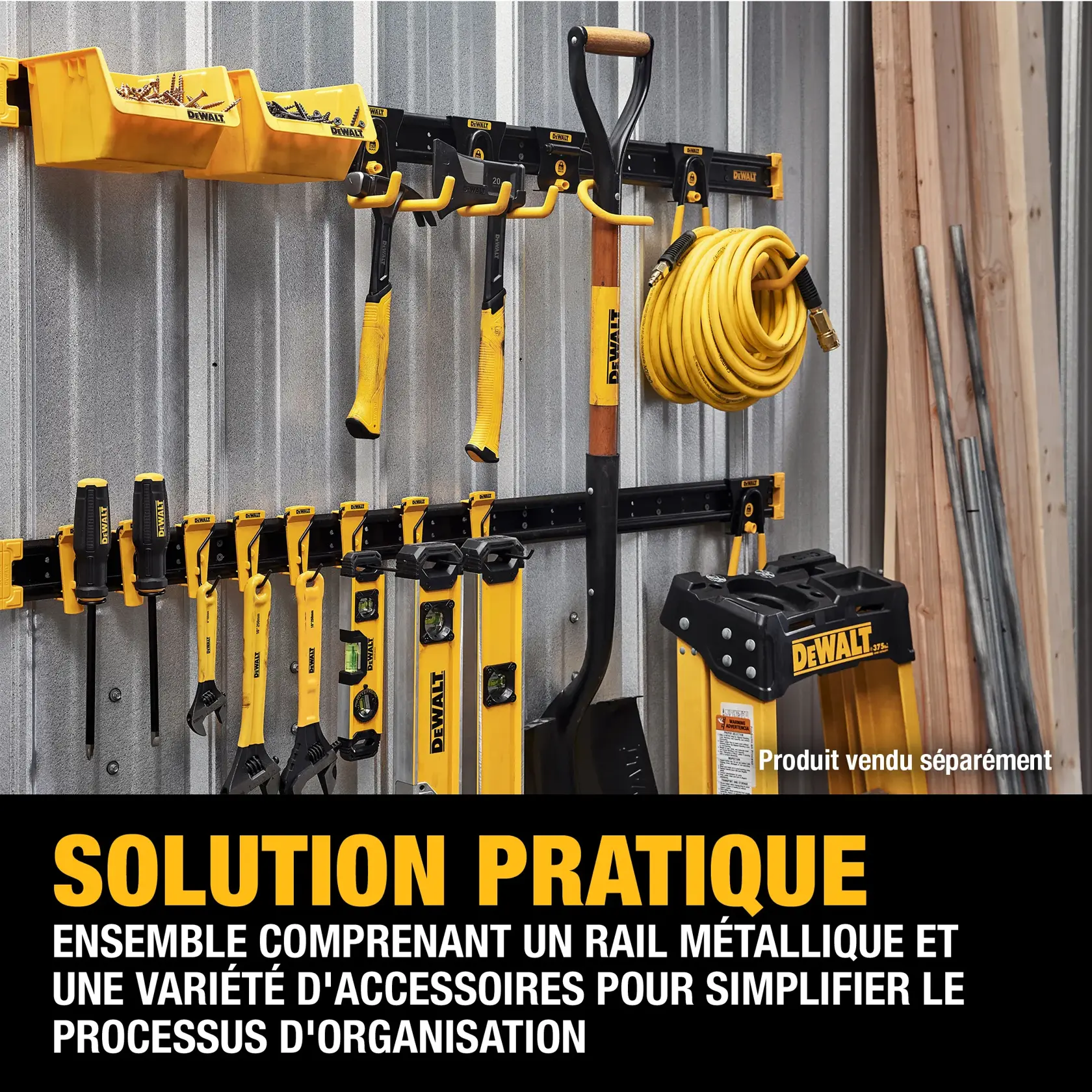 A DEWALT wall organization system is shown mounted on a metal wall. The kit includes a metal track and various yellow and black accessories, such as hooks, bins, and holders, organizing tools like hammers, levels, screwdrivers, a shovel, and a hose. The text on the image describes this storage kit as a total solution for organizing tools, though some products are sold separately.