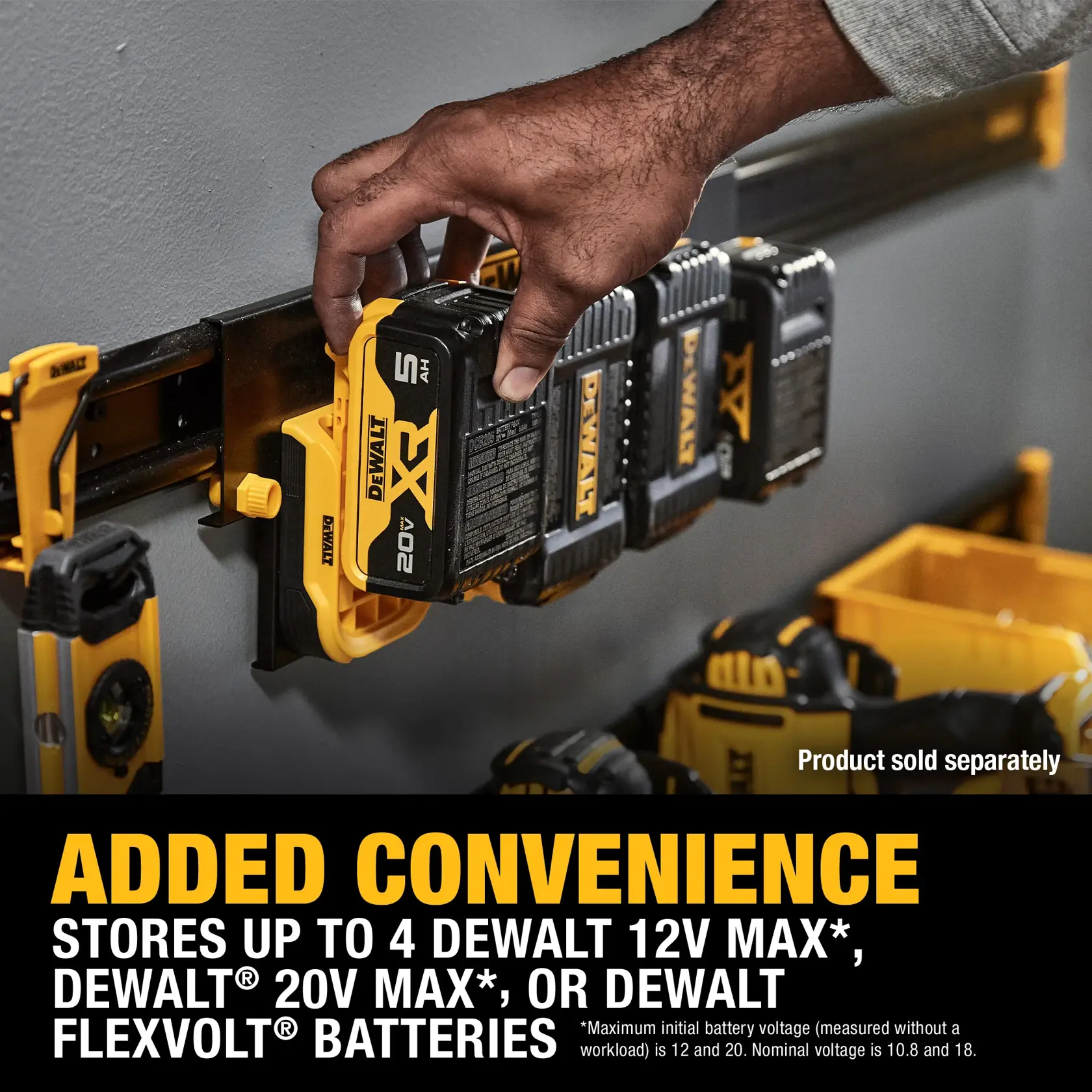 A DEWALT battery storage rack mounted on a wall holds up to four DEWALT 12V MAX, 20V MAX, or FLEXVOLT batteries. A hand is placing a battery into the rack. Other DEWALT tools and accessories are visible nearby. The text emphasizes added convenience for battery storage.
