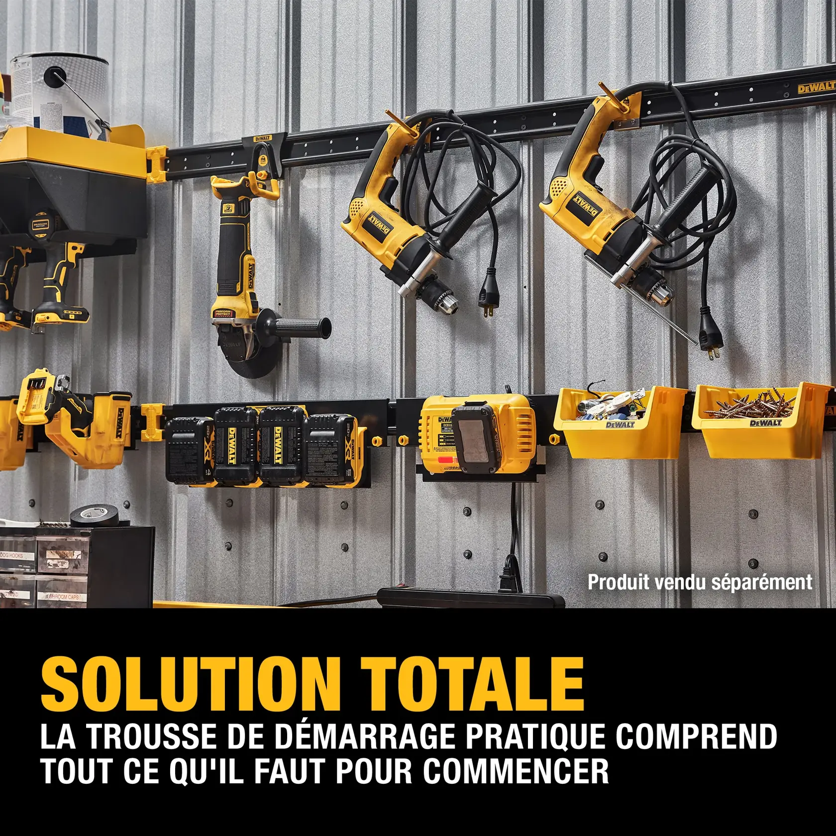 A metal wall with a DEWALT tool organization system mounted, holding various yellow and black DEWALT power tools, battery chargers, and bins for accessories. The image promotes a convenient starter kit that includes everything needed to get started. Text on image reads: 'TOTAL SOLUTION. Convenient starter kit includes everything needed to get started. Product sold separately.'