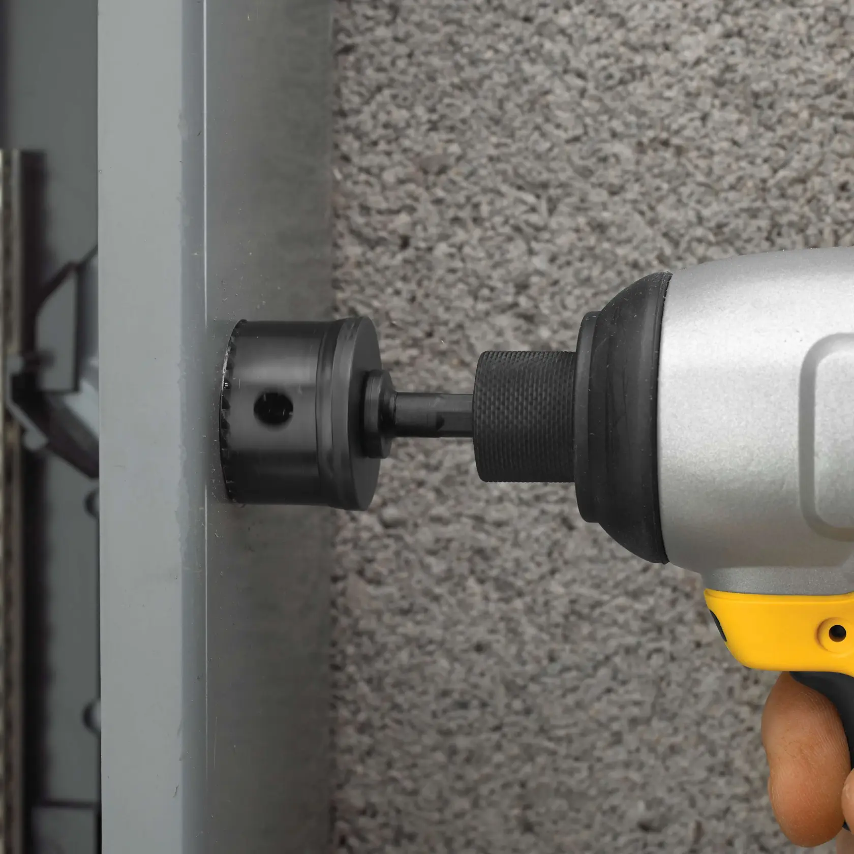 DEWALT hole saw bit with an ejection spring, shown above a label that reads 'Quick Plug Removal with Ejection Spring'.