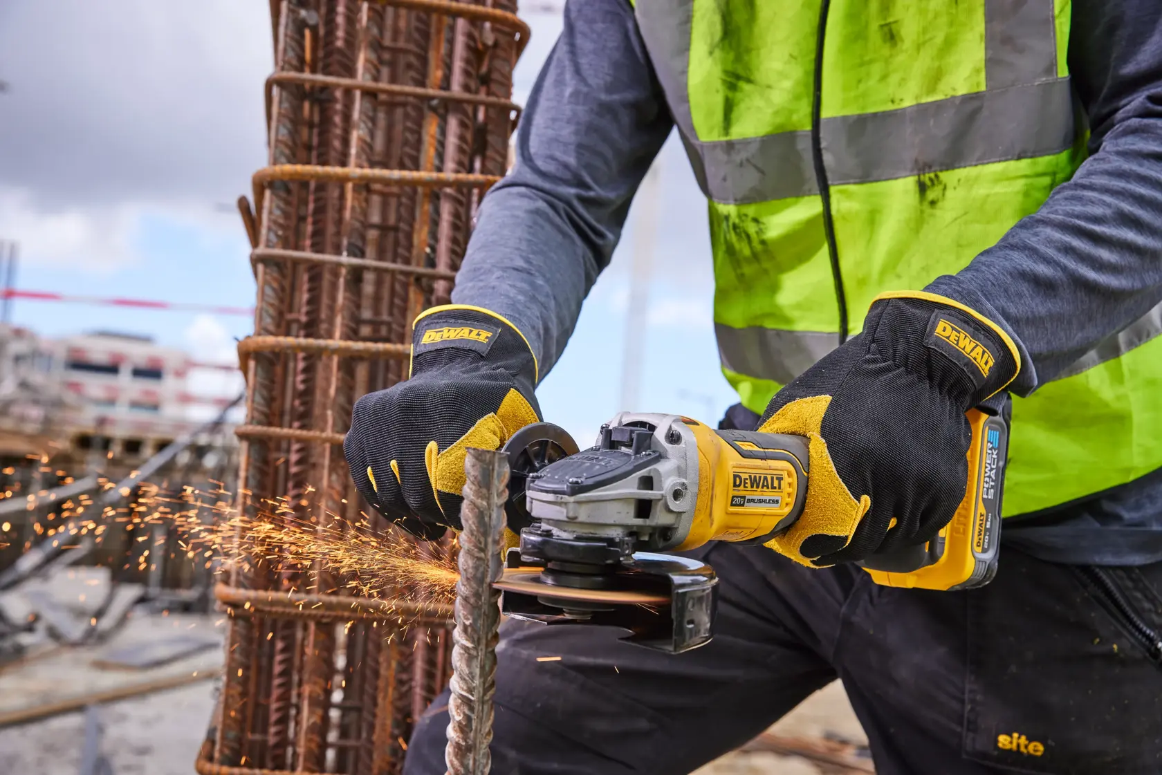 Promotional image for DEWALT XR PowerStack battery showing a new design. The text says 'NEW LOOK. SAME RELIABLE BATTERY.' Two yellow DEWALT batteries are depicted: the left one has the old design, and the right one shows the new design, with an arrow pointing from old to new. Features logo and voltage details at the bottom.