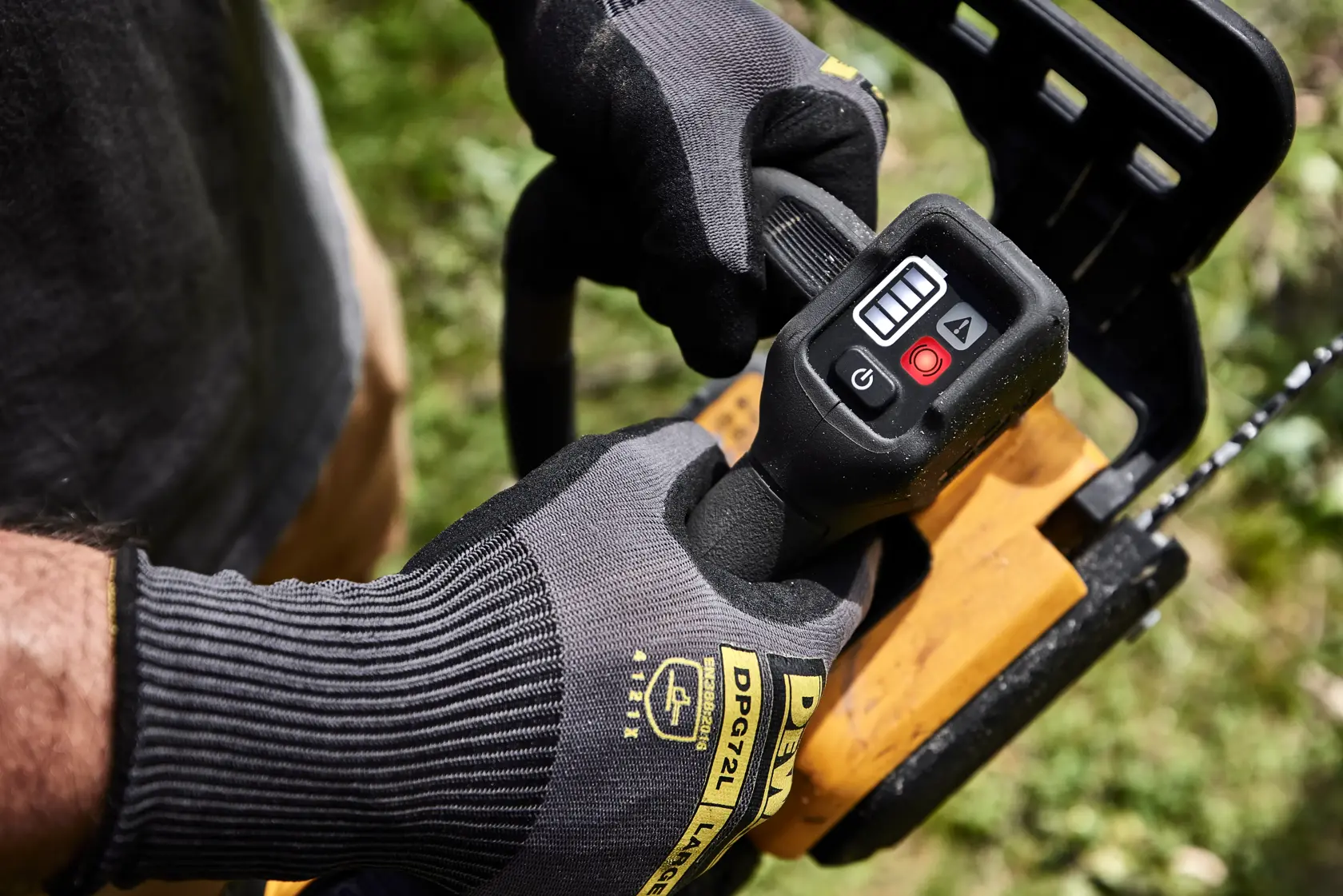 A DEWALT 60V cordless chainsaw with a brushless motor and 14 inch bar, displayed against a tree bark background. Text highlights its peak horsepower of 2.42HP.