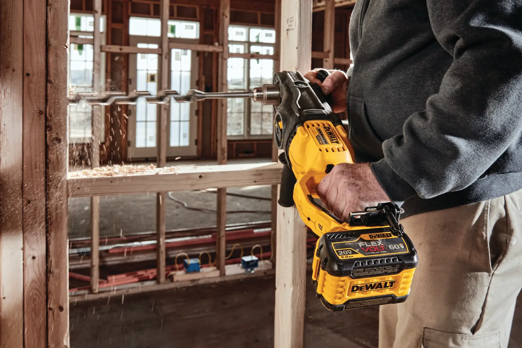 Close-up of a DEWALT power tool showing the Perform and Protect E-Clutch indicator with a yellow and black design. The bottom text reads 'E-CLUTCH INDICATOR'.