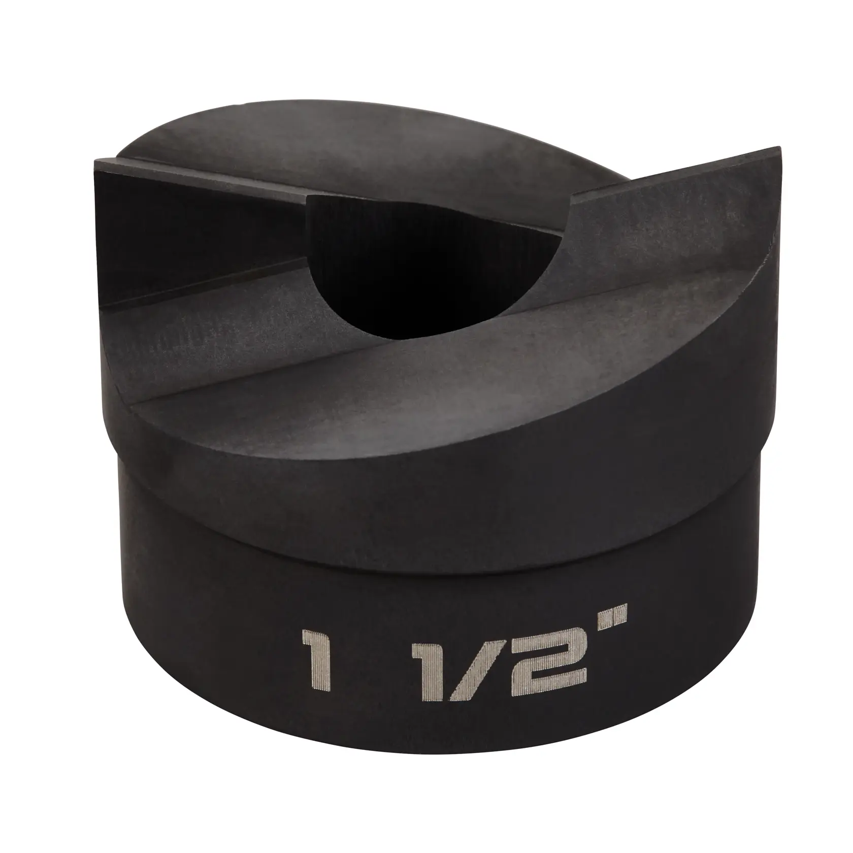 A close-up of a black metal round punch die with a slotted edge and the marking '1 1/2"' engraved on its side.