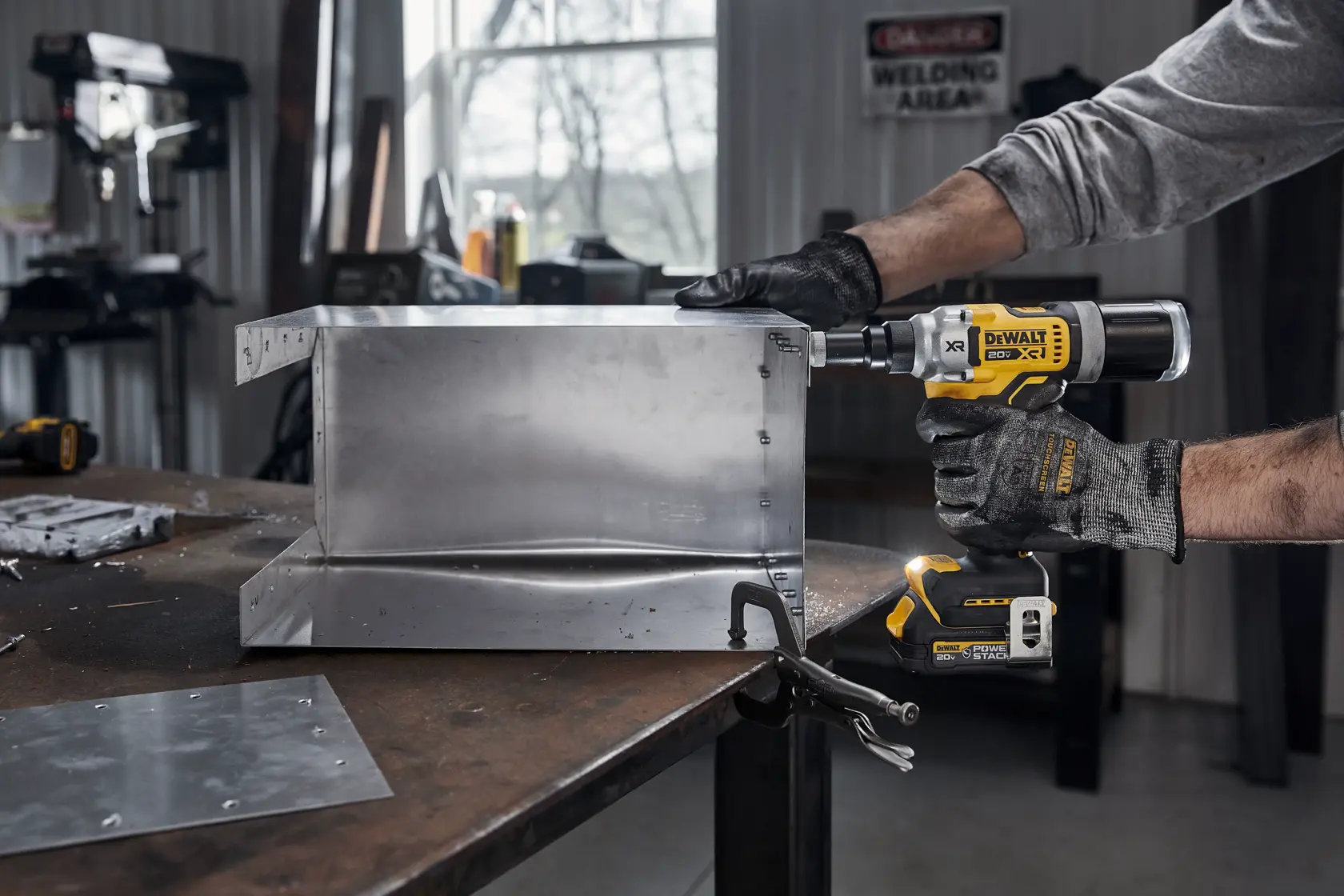DEWALT 20V MAX* XR® 1/4 Inches Rivet Tool HVAC shop application image