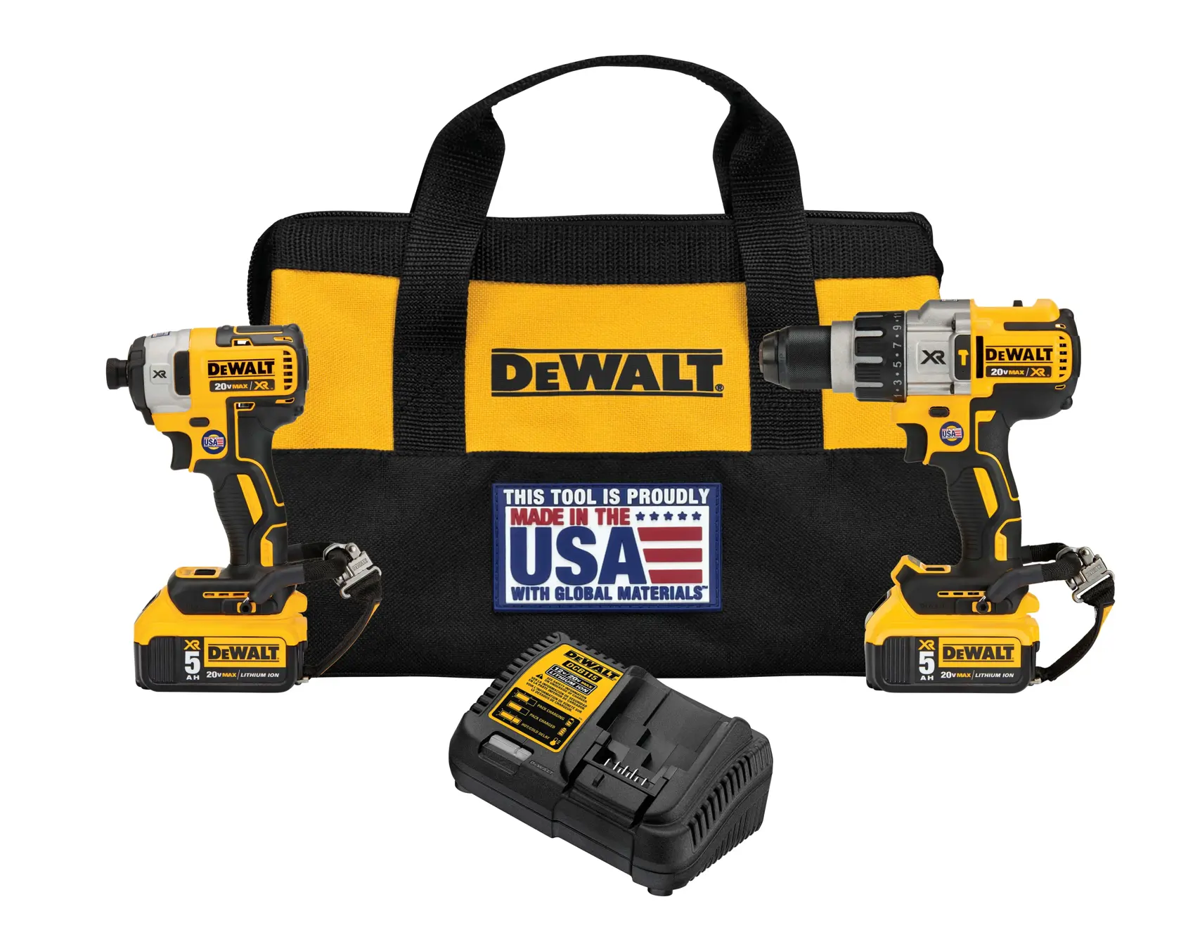 DEWALT cordless tool set including a yellow and black carrying bag, a cordless drill, a cordless impact driver, and a battery charger. The bag has a DEWALT logo and a label stating 'Made in the USA with Global Materials.'