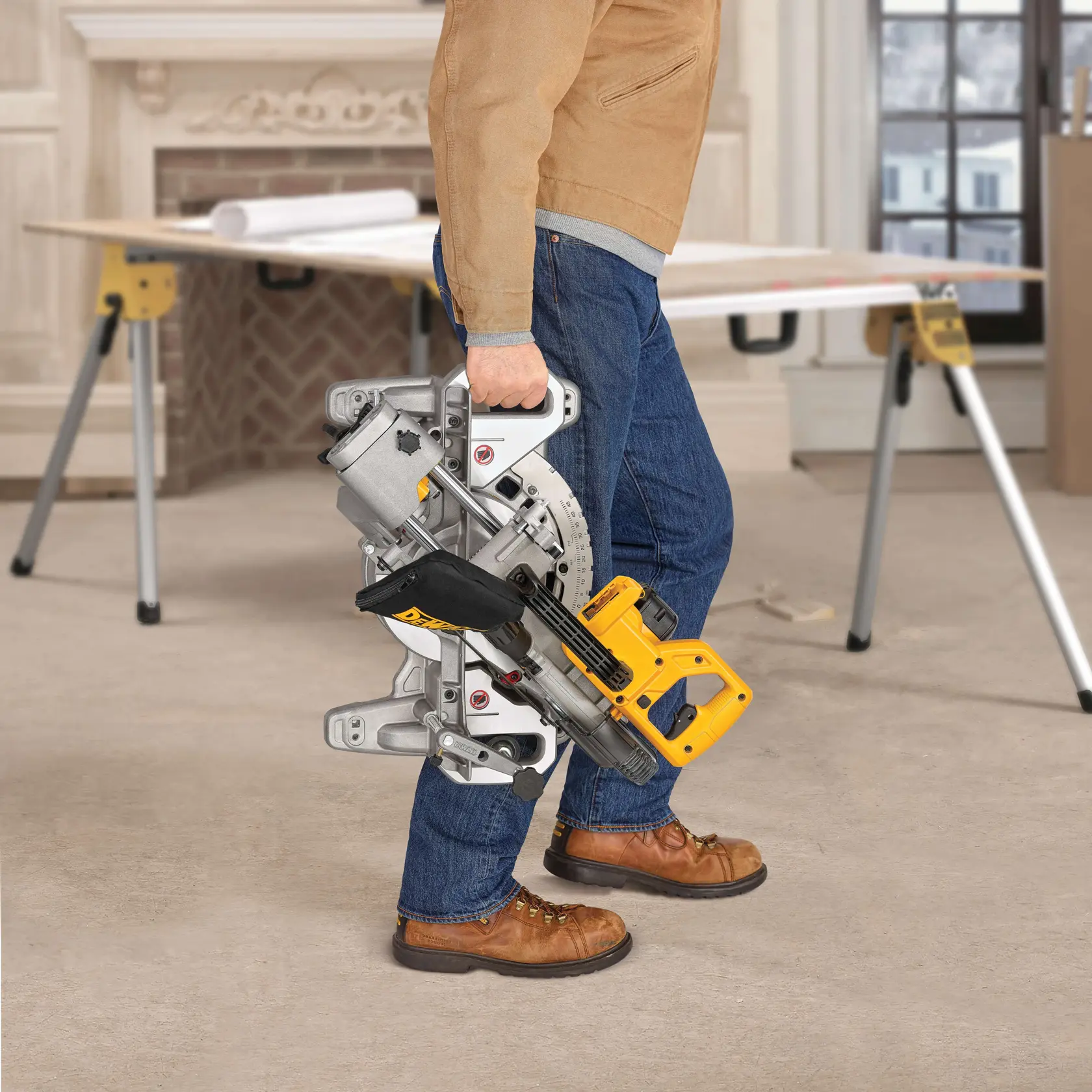 DEWALT 20V cordless miter saw with compact design, stainless steel plate and cam lock handle.