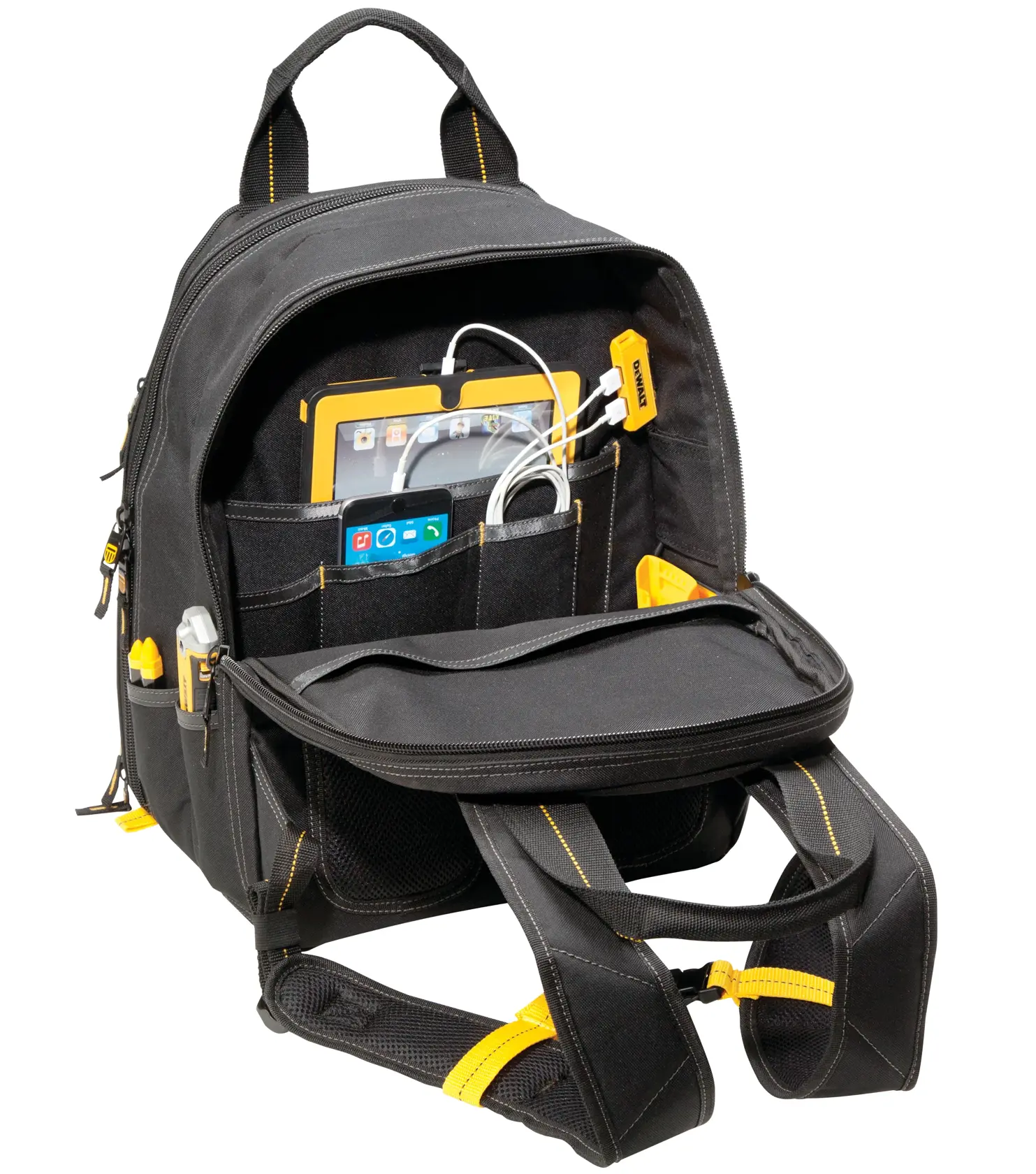 A black DEWALT backpack with yellow accents, featuring an open front compartment containing a tablet, a phone, charging cables, and several tools organized in pockets. The backpack is designed for carrying electronic devices and accessories.