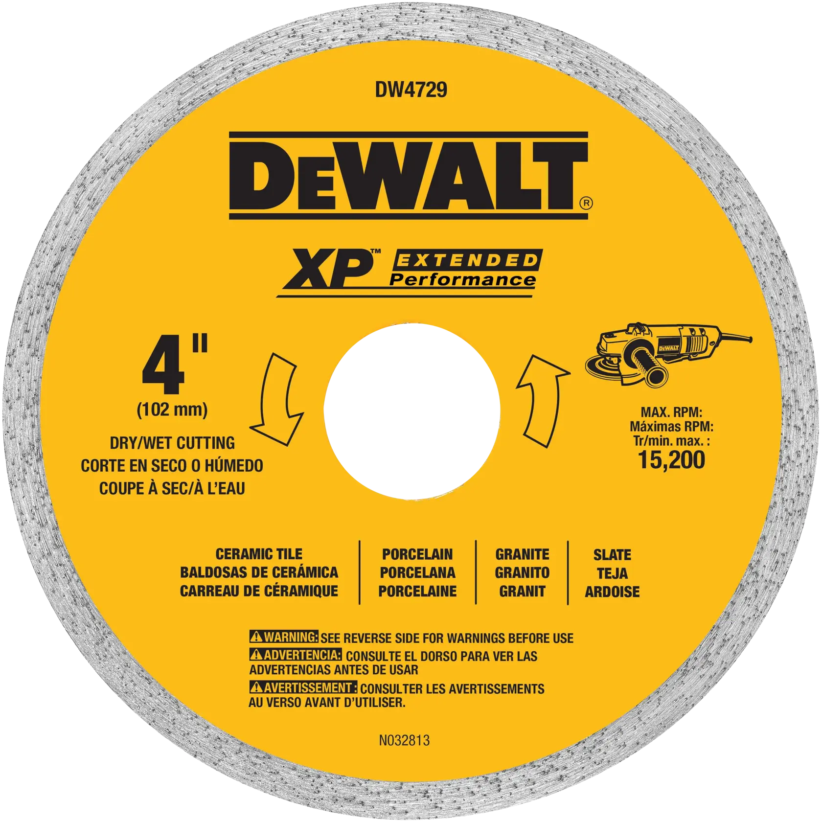 A close-up of a DEWALT DW4729 4-inch XP Extended Performance cutting wheel, designed for dry or wet cutting of ceramic tile, porcelain, granite, and slate. The wheel is yellow with clear product information, including maximum RPM of 15,200 and safety warnings in English, Spanish, and French.