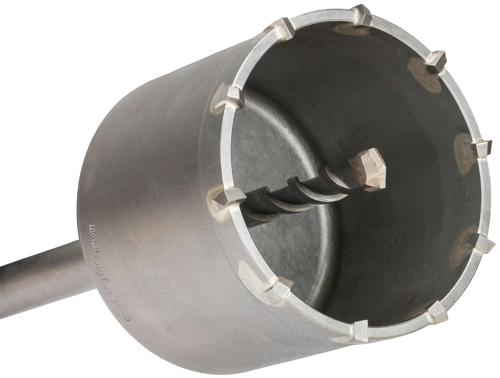 Close-up of a metal hole saw drill bit with carbide teeth, designed for cutting through masonry or concrete surfaces.
