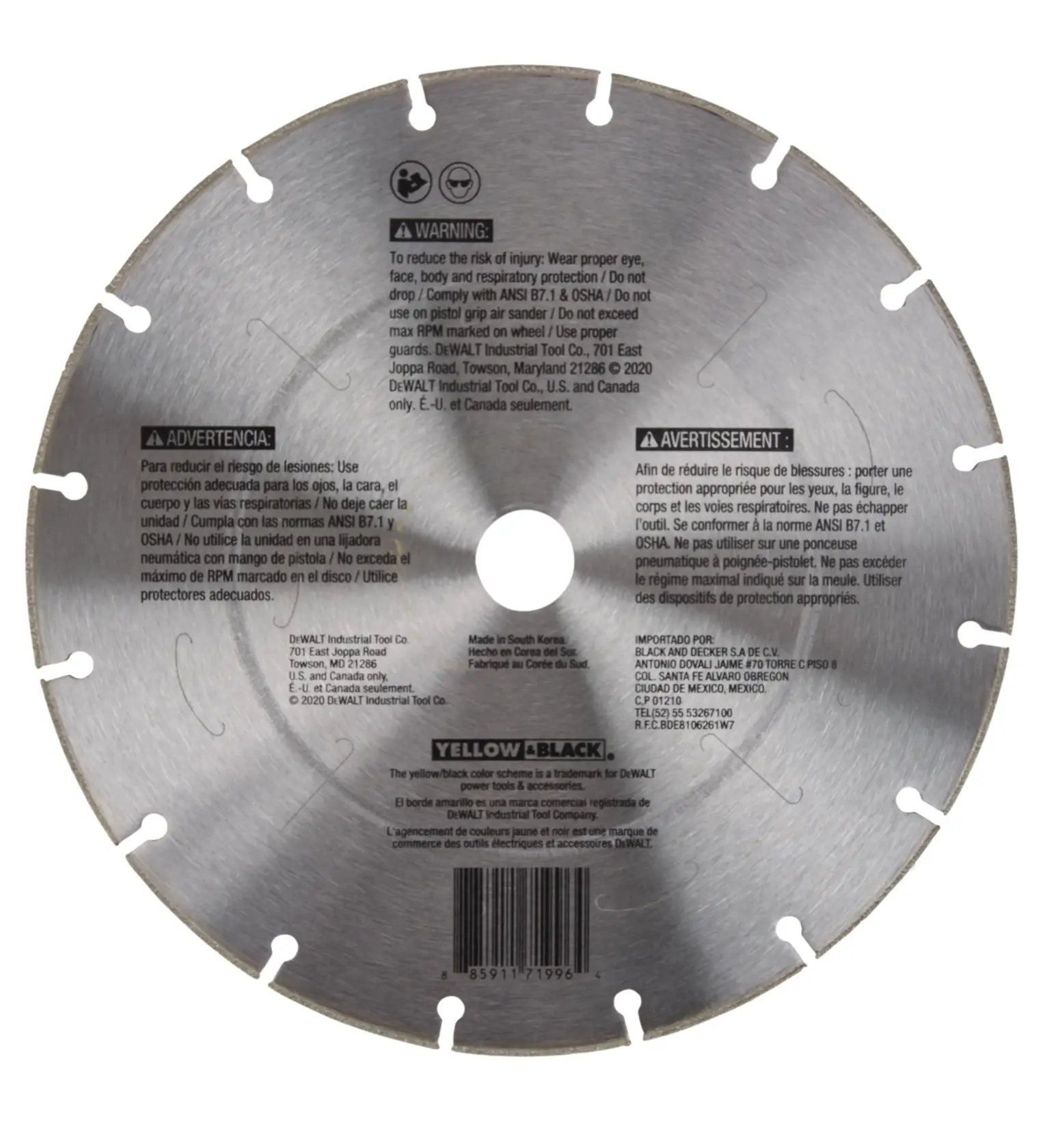 A DEWALT branded circular saw blade, silver in color, with warning and usage instructions printed in English, Spanish, and French. The blade has evenly spaced notches around its edge and a central hole for mounting.