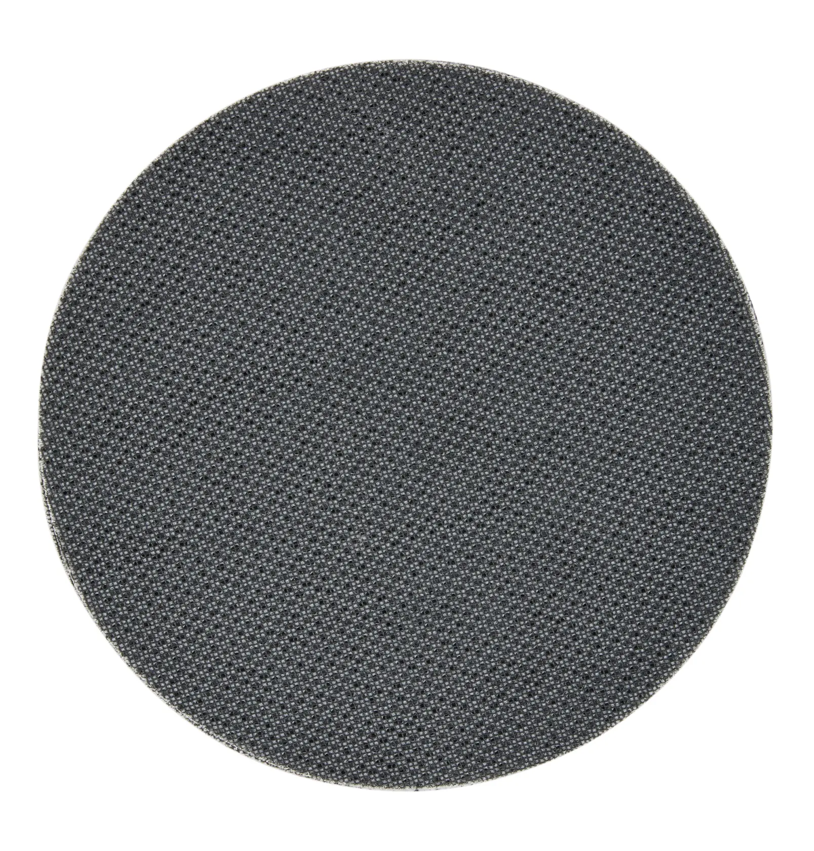 A close-up photo of a round, dark grey abrasive sanding disc with a textured surface.