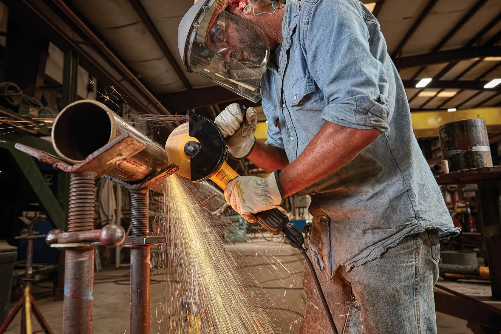 Image showing a DEWALT DWE43244N 6-inch brushless paddle switch small angle grinder with a yellow and black design. The tool is accompanied by a side handle, guard, hex key, and inner and outer flange as listed in the included components.