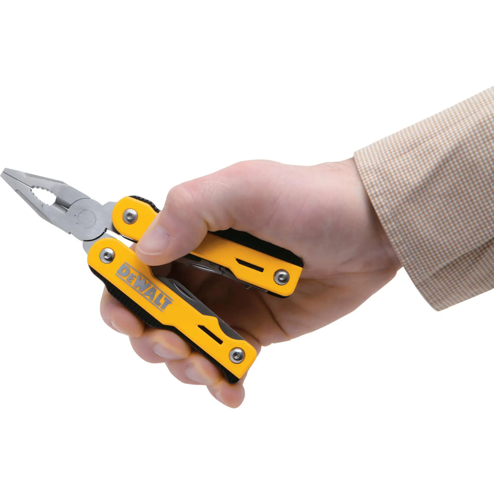 A person is holding a yellow and black DEWALT multi-tool pliers in their hand, with the tool partially open. The person is wearing a long-sleeve, light brown checked shirt.