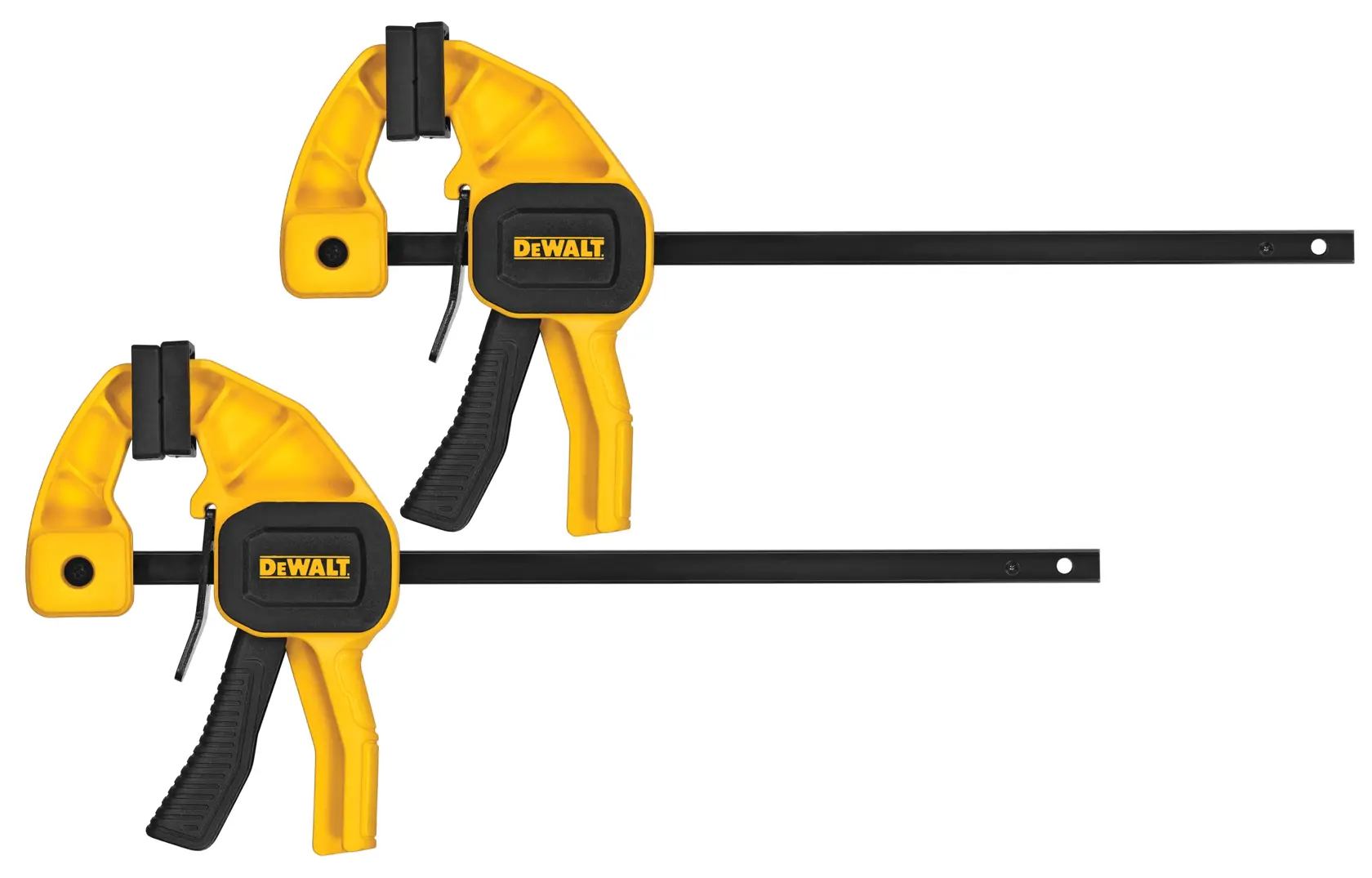 Two DEWALT trigger clamps with yellow and black handles and long black bars, used for securing materials in woodworking or construction.
