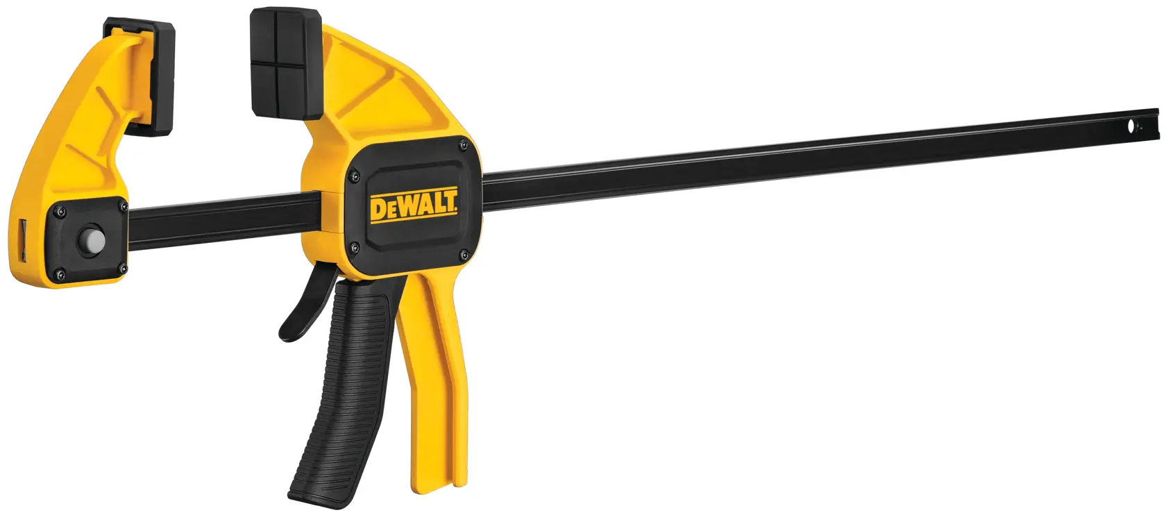 A DEWALT trigger clamp with a yellow and black design, used for holding materials together during woodworking or photography setups.