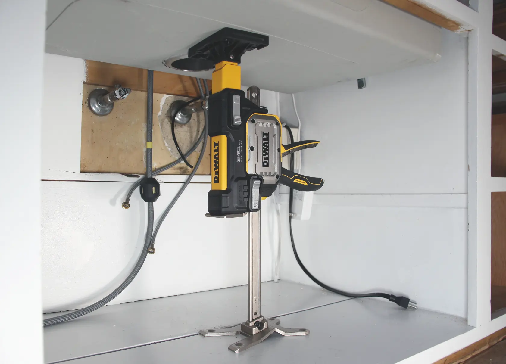 DEWALT DWHTPAD, DWHT83554 photography tools used under sink for pipe work.