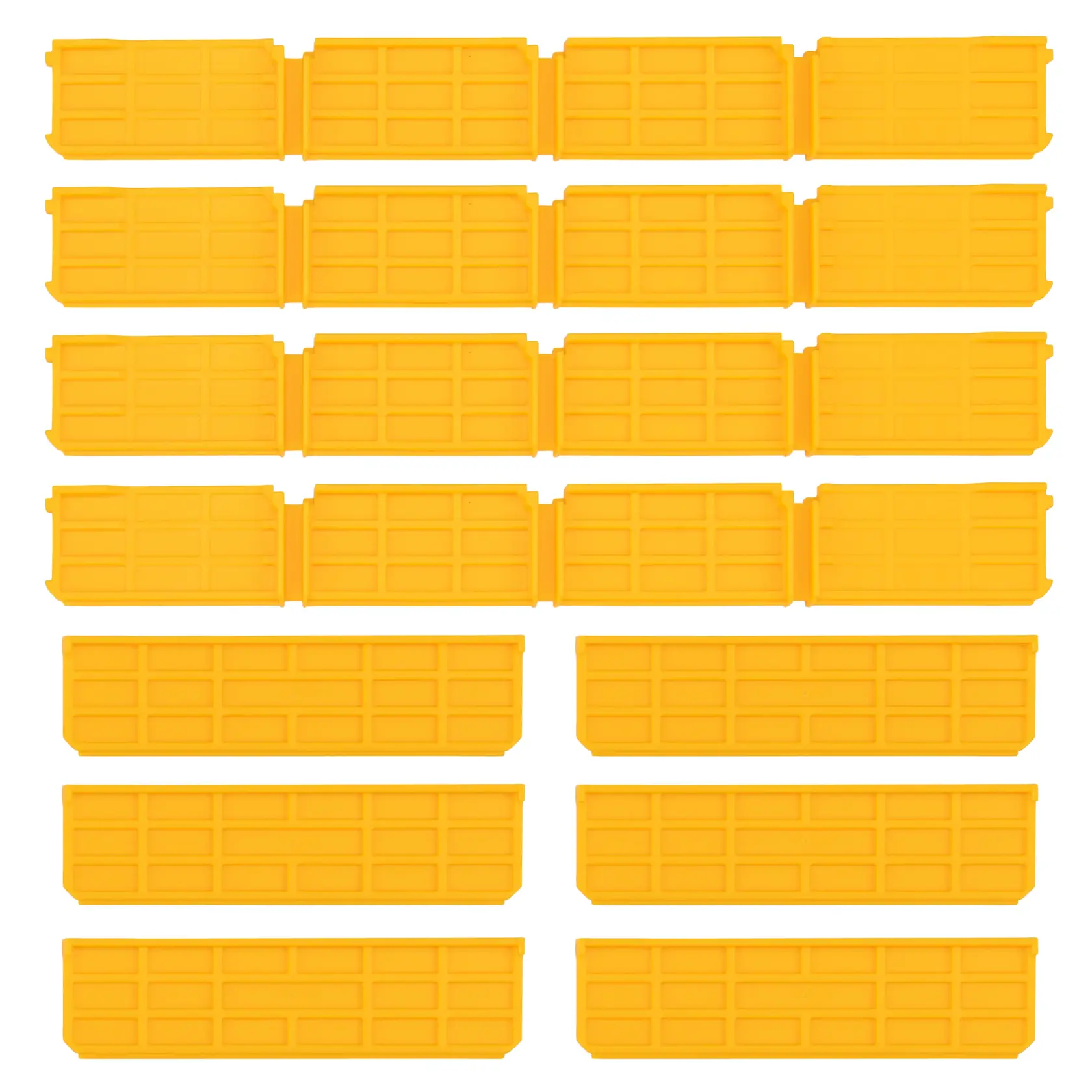 A set of yellow plastic dividers for organizing storage boxes, shown laid out separately.